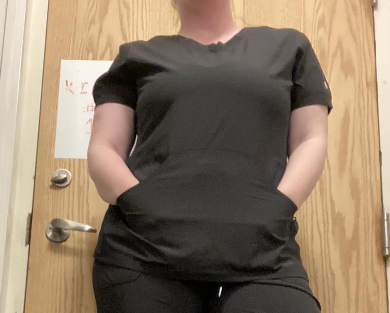 This top also has lots of pockets. Very useful.