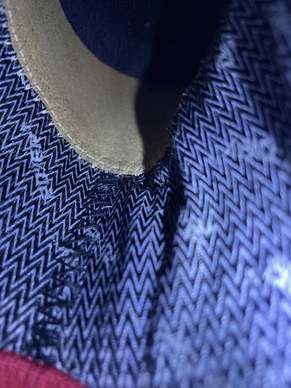 Stitching at top of heel