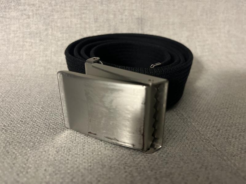 Buckle easily abraded by seatbelt.