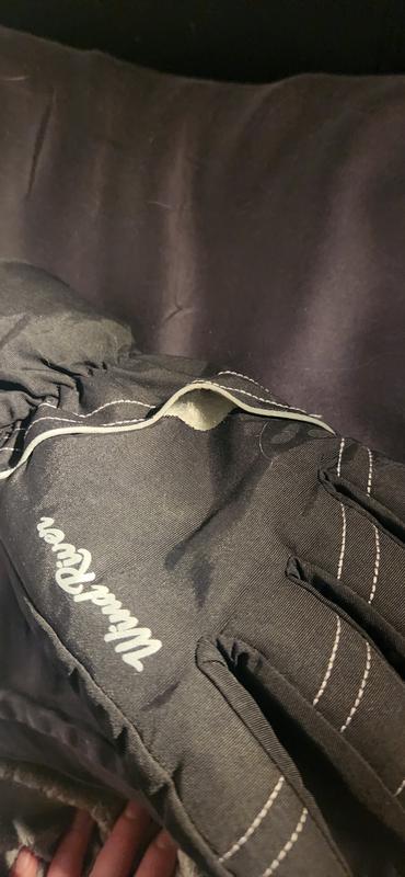 Seam ripped along reflective stripe