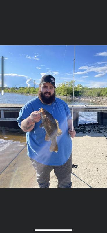 My son fishing & shirt fits just they way he likes it