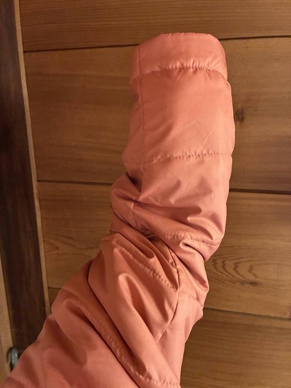 Left sleeve sewn twisted, can't get arm through.