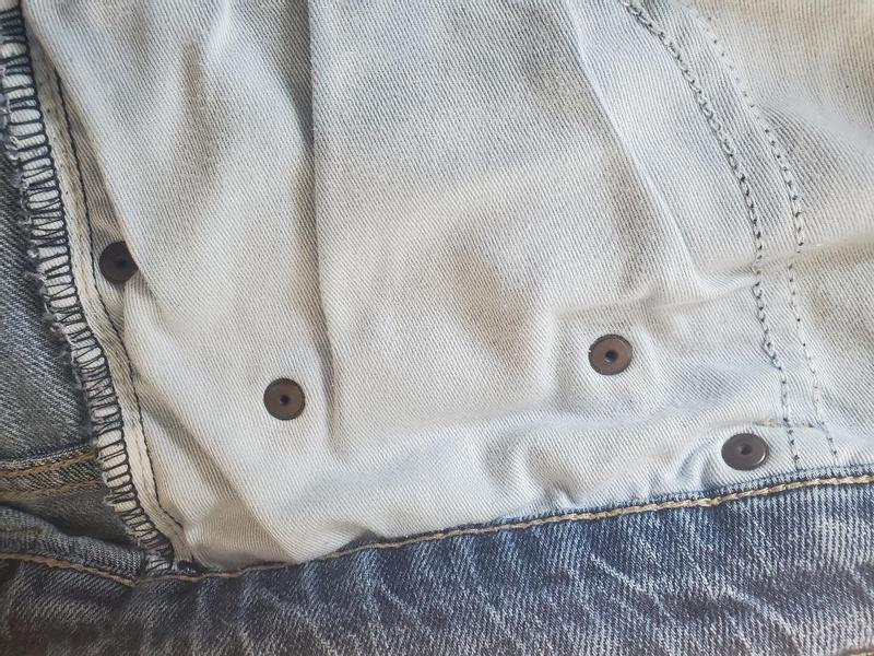Old pant with rivets