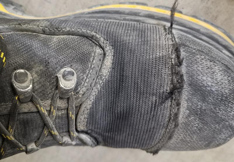 Right Boot: Toe cap seam also fraying. Fabric around lacing lugs has wear, seam on side of boot is showing wear.

This is after two weeks of 10s. Sheet metal worker, inside building, concrete floors.

No cuts or tears, these are just from poor quality