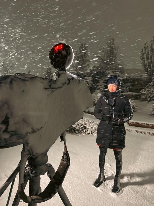 The snow is accumulating on me sideways but I still stayed warm.