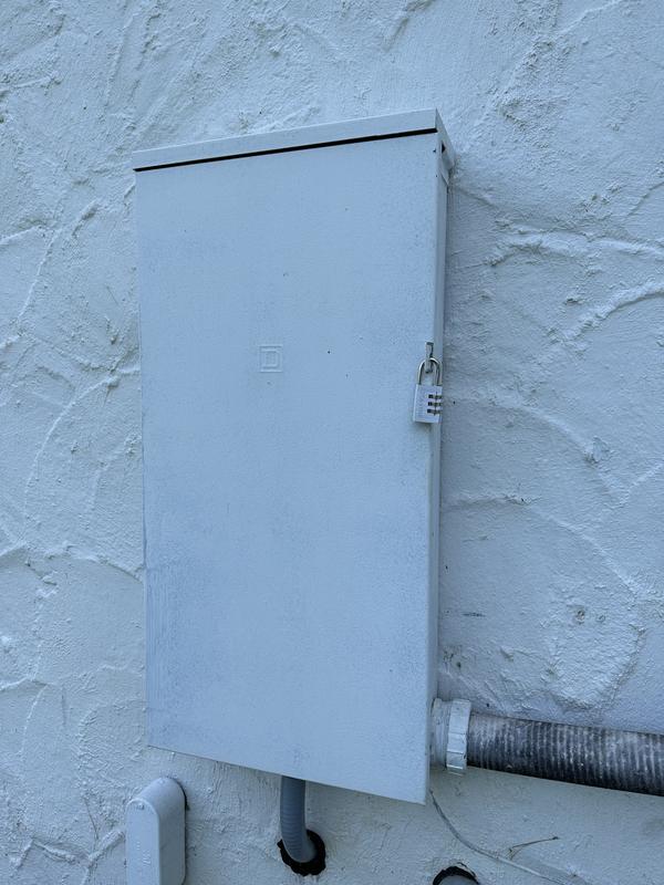Master Lock on outside electric utility box