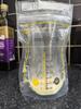 Partly filled with breastmilk and freestanding