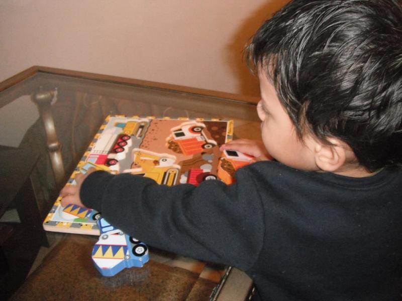 Jaden doing puzzle tiime