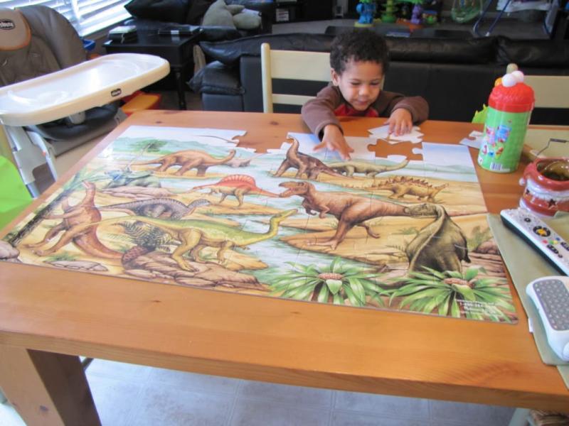 Devin working on his puzzle
