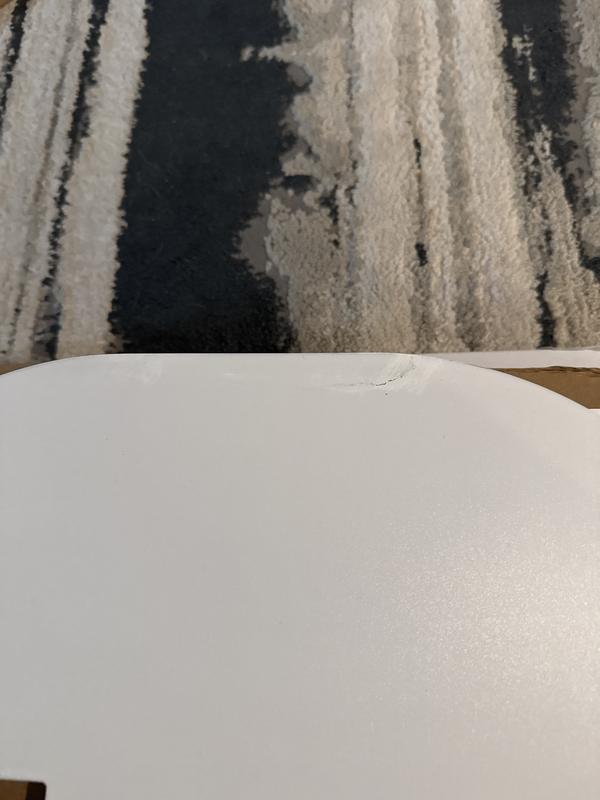 Someone tried to to hide it by glue and paint.. you used the wrong color white..