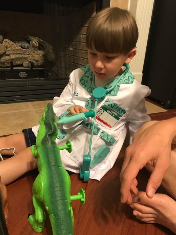 Giving the dinosaur a check up