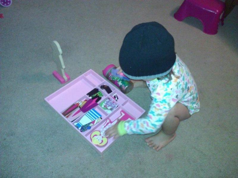 Abby with her Abby & Emma dolls.