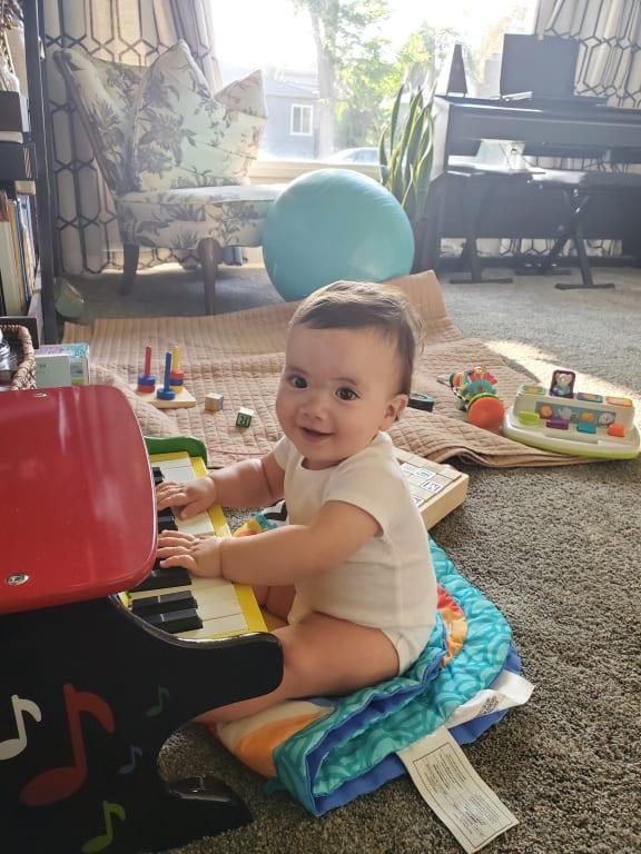 Baby Amelia with her piano :)