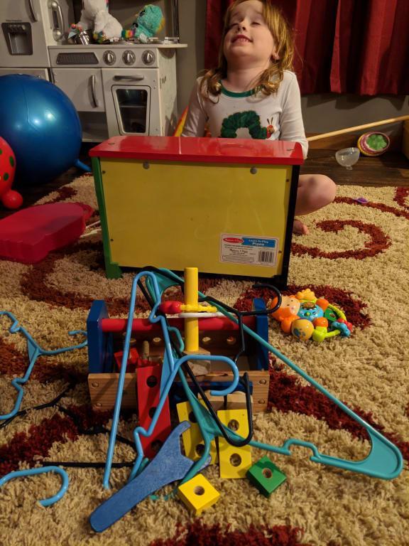 Also in the picture is a Melissa and Doug tool set, although my kid was building an odd pyramid out of it