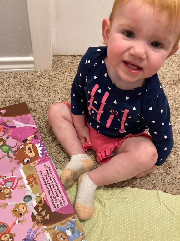 Happy smiles as she hears the pops