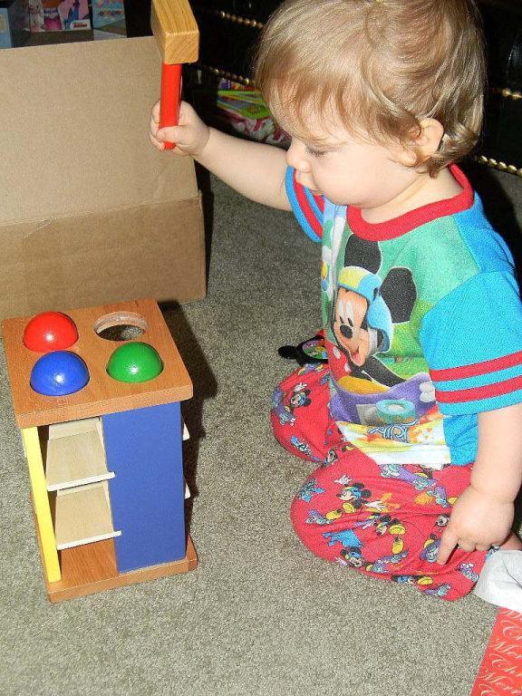 Playing with his new toy