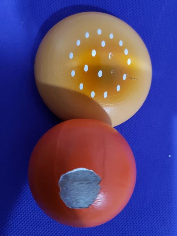 The top of the orange came off in 1 piece and was barely holding on straight out of the package...