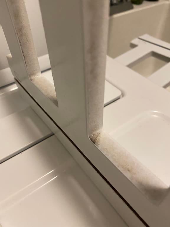 It is not a shadow in the corners. It won't come out.