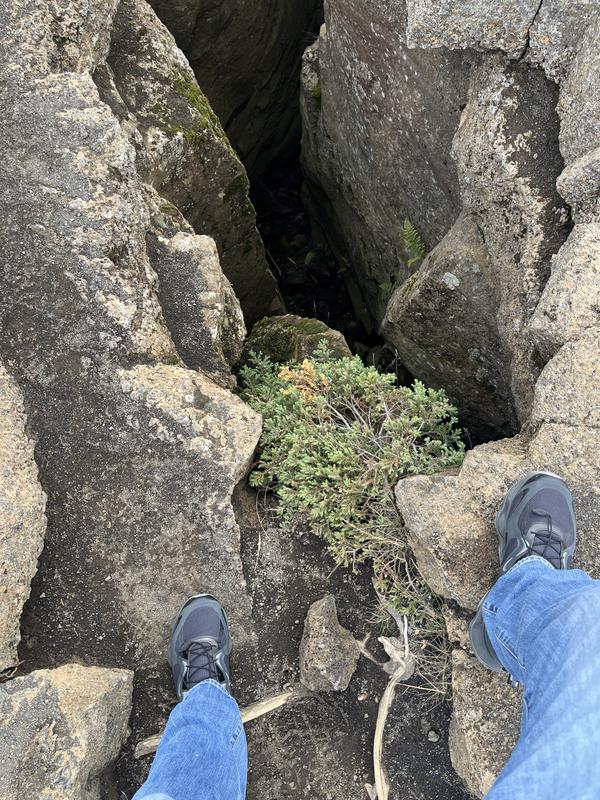Standing on the Continental Divide with one Merrell in Europe and the other in North America