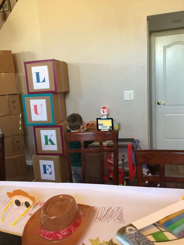 Even during a party he wants to play with the checkout