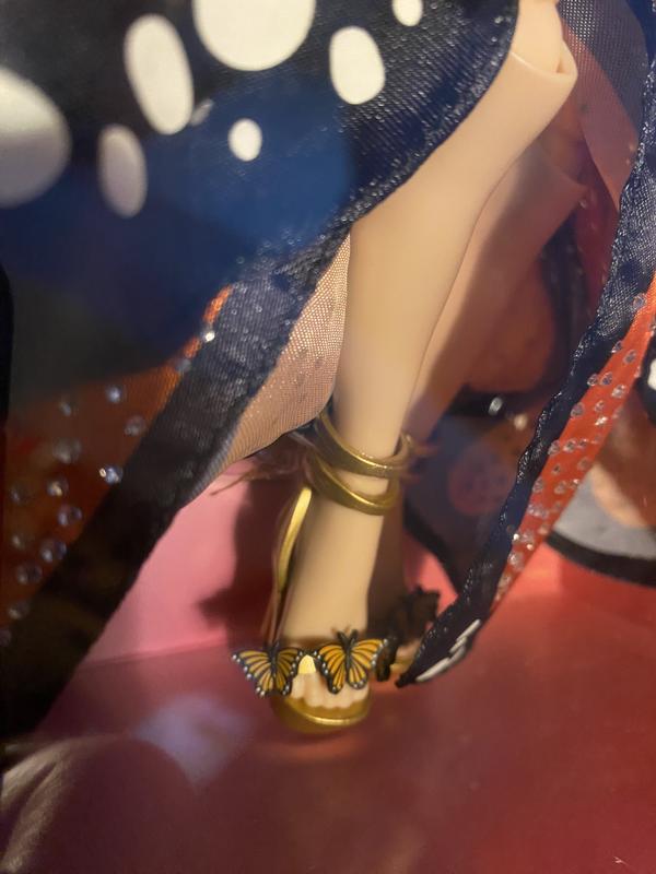 Butterfly on her shoes