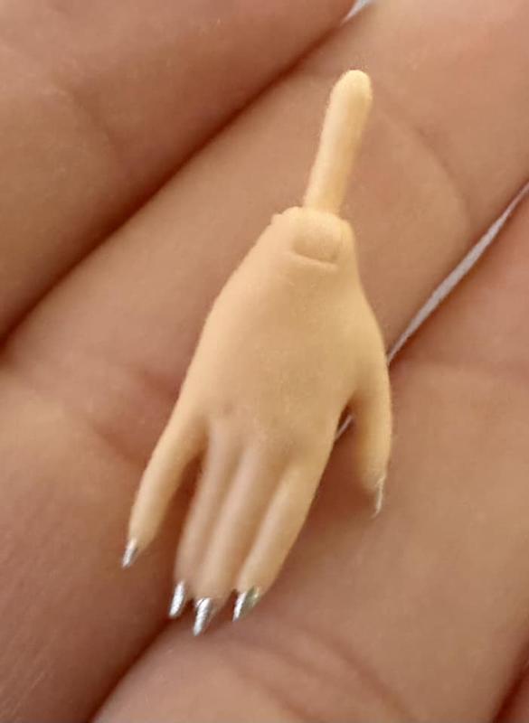 Hands are removable to put on clothes easier, weird to me lol