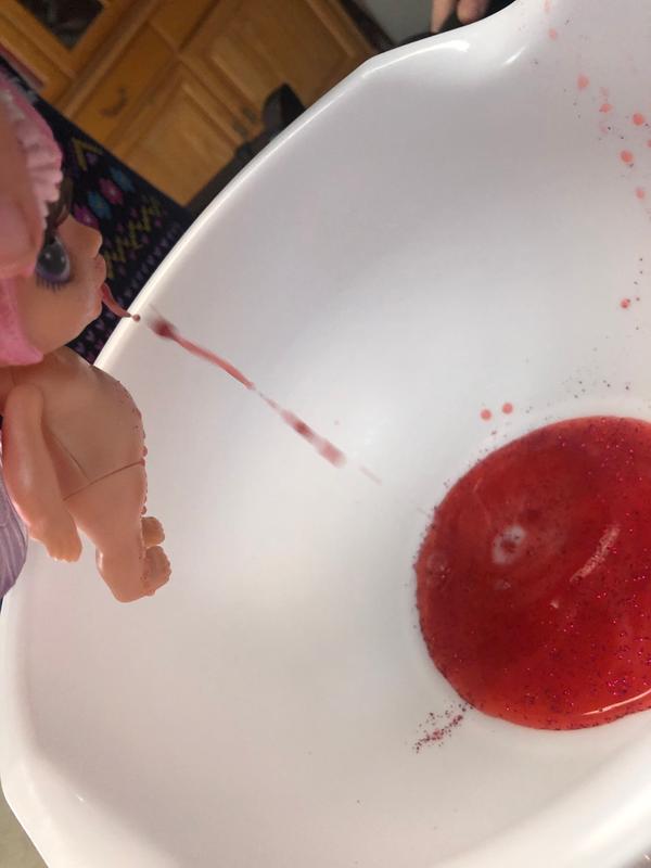 The doll looks like she's puking blood