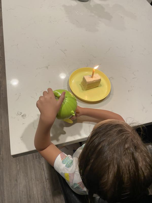 Giving her Loopsy doll a birthday party