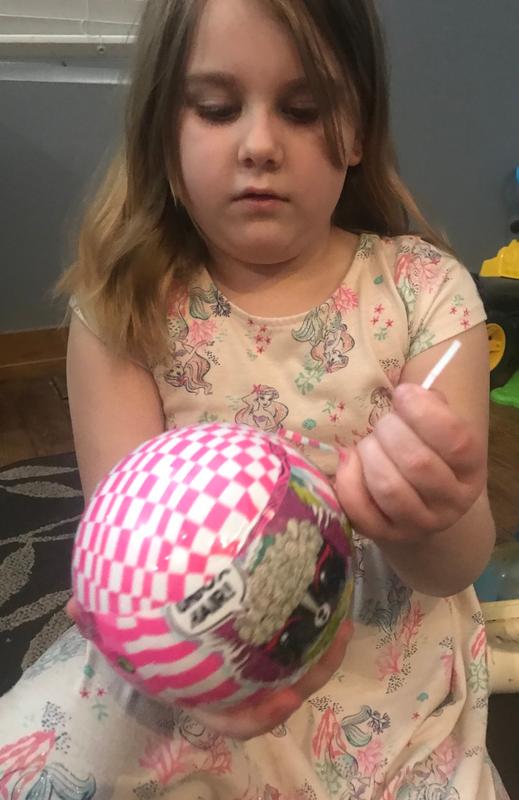 Unboxing her new toy!