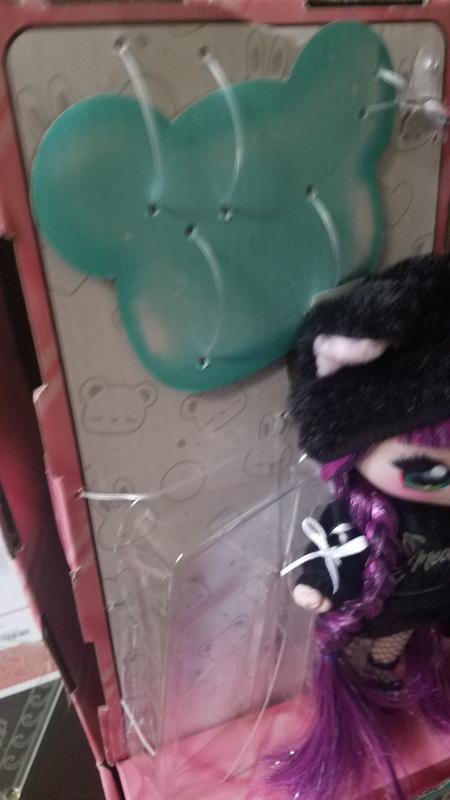 Doll and accessories strapped in