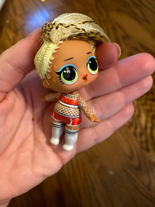 After being dipped in cold water. (Her boots actually turn black as well, but I held them while trying to take a picture and they turned back to white very quickly)