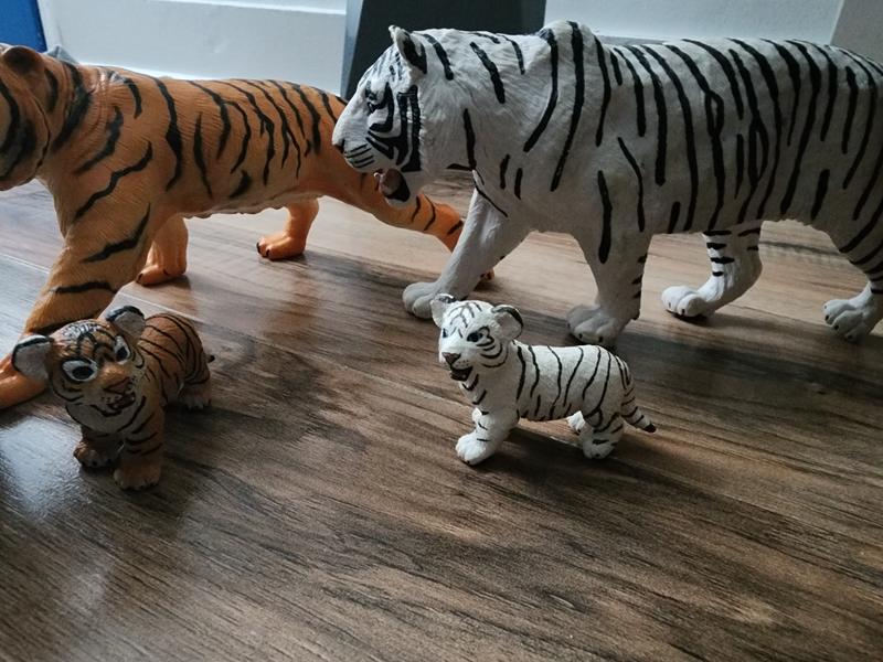 Find the Safari Ltd® White Bengal Tiger Cub at Michaels