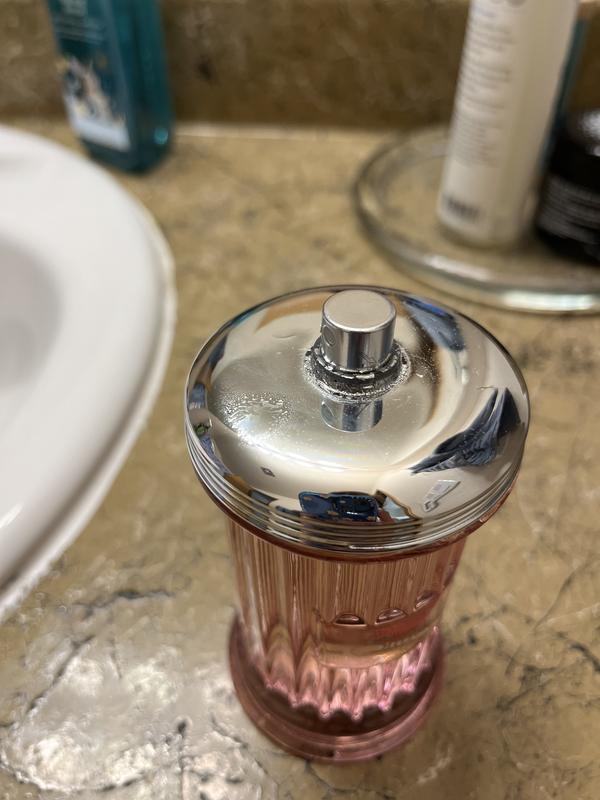 You can see the silver coating starting to peel. I also just sprayed the perfume and you can see how much gets on the top of the bottle.