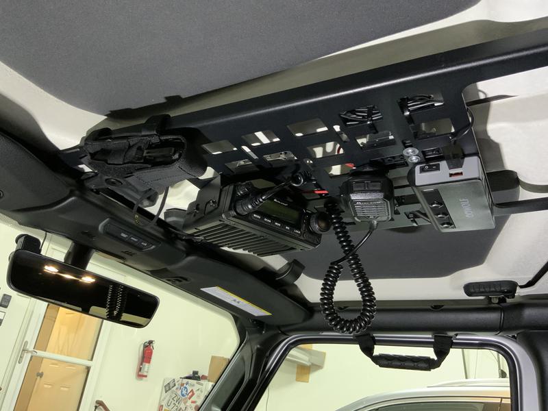 Installed on overhead molle rack in Jeep JT.
