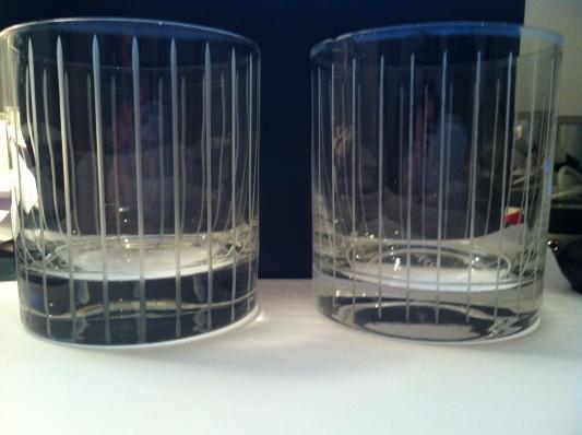 The left glass is the thicker, older glass