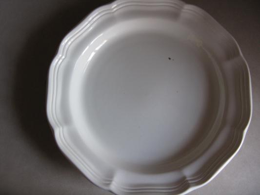 Plate with black mark.