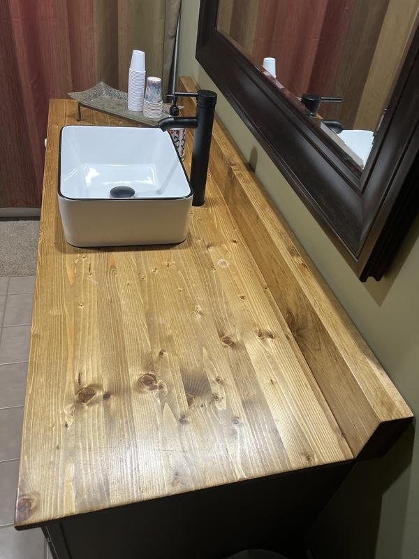 Bathroom countertop I made a couple of years ago, finished with 7 coats of Minwax Tung Oil Finish.