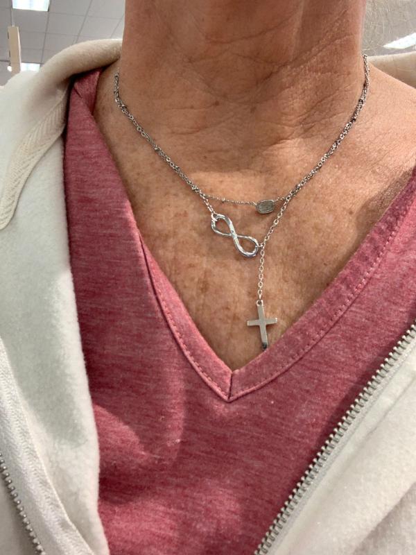 Customer photo for "Infinity cross necklace."
