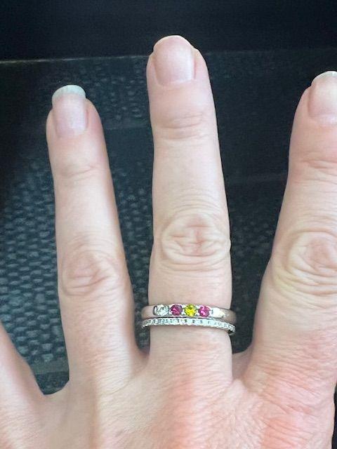 Customer photo for "Love the stacking ring. I matched it with the birth stone ring I also ordered."