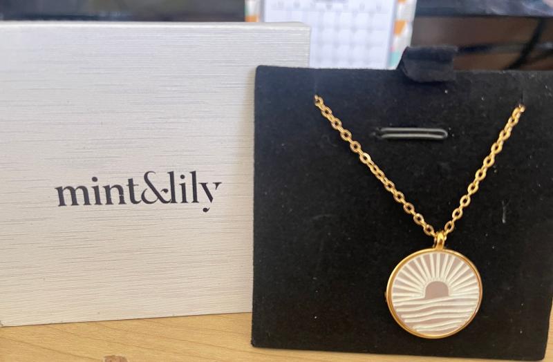 Customer photo for "Beautiful Mother of Pearl Sunrise Pendant Necklace"
