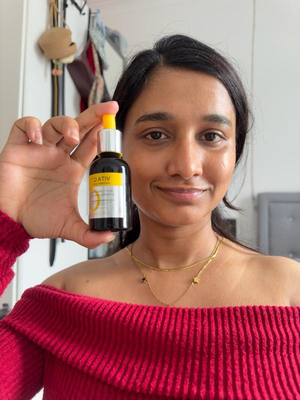 Customer photo for "Lightweight, non-sticky, and leaves my skin looking fresher andbrighter with consistent use."