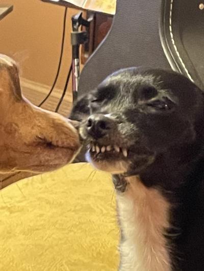 She loves showing her white teeth.