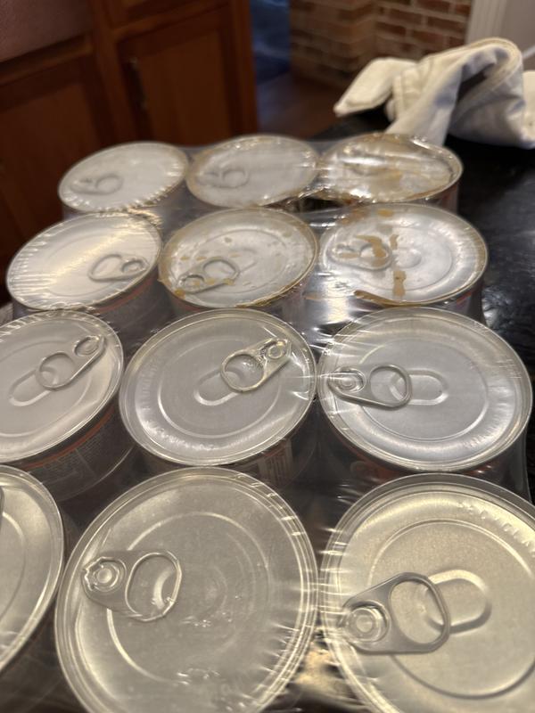 Cans dented and leaking priduct