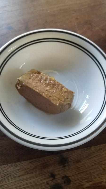 As it comes out of the container