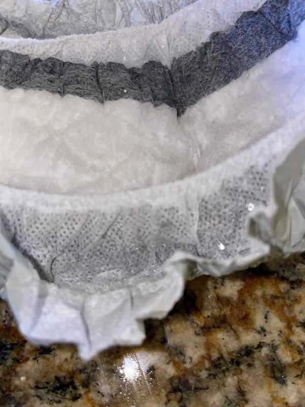 My poodle is comfortable. The wrap is fully adjustable and securely closes. The inner layers prevent leaks and even after pouring in 1/2 cup of water nothing leaks out and the liner stays dry to the touch.