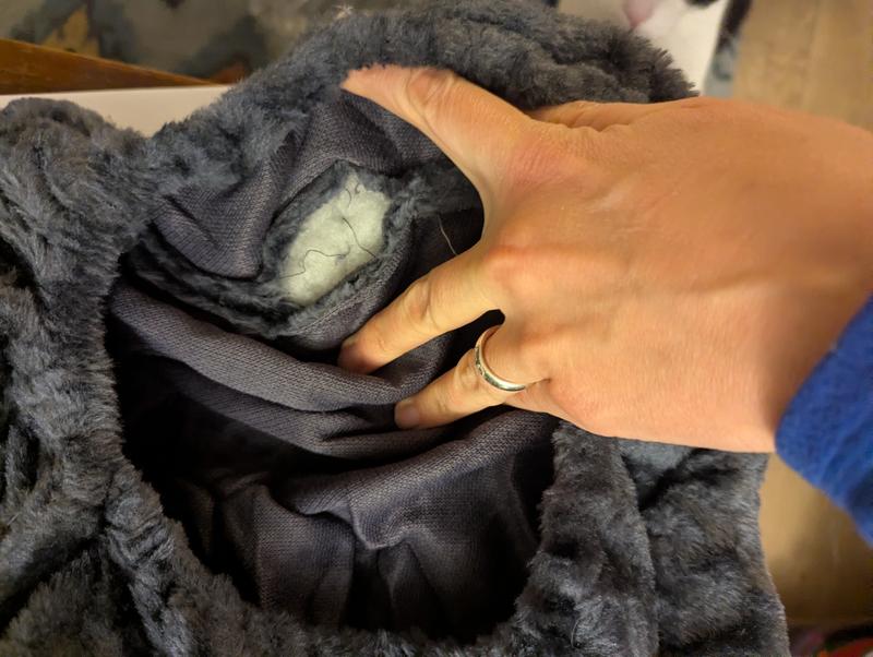 Received with seam in perch cover ripped open