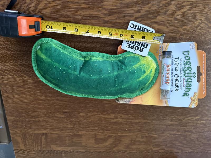 The Doggijuana Tuffer Chewer Refillable Juananip Dill Pickle Tough Squeaky Dog Plush Toy is about 10” long