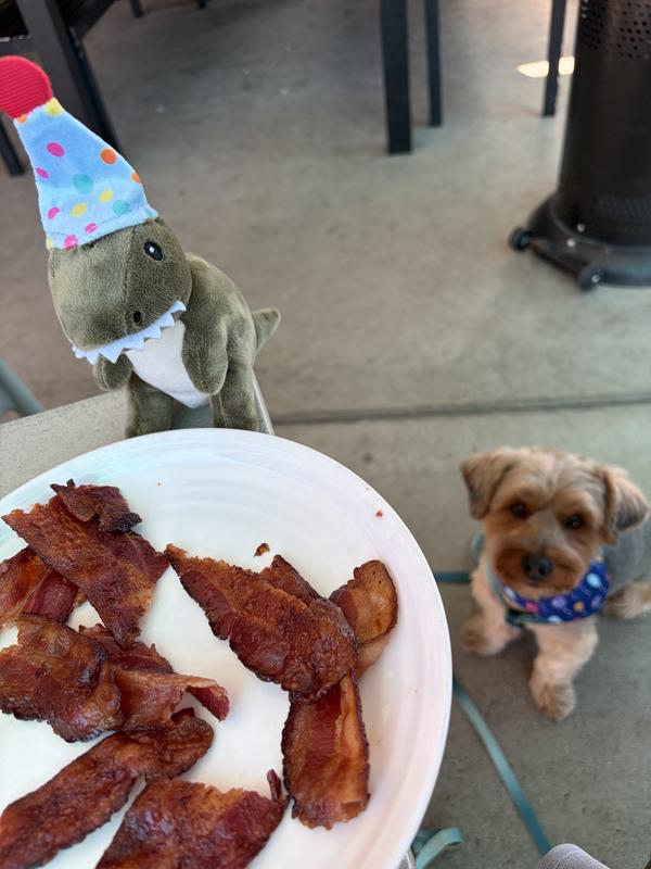 Bacon and dinosaurs and the cutest little birthday boy.