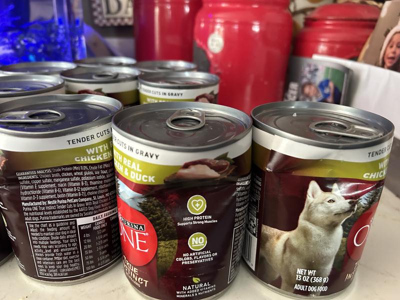 More pics of smashed Purina One cans
