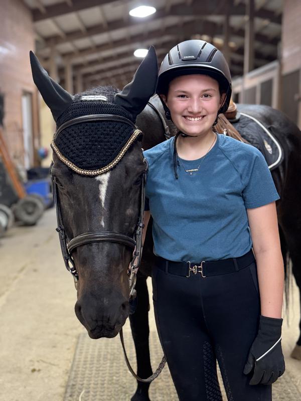The fly bonnet exceeded our expectations with the gold chain.  The saddle pad was also a perfect pairing for a schooling day and even at a special D1 pony club certification day.